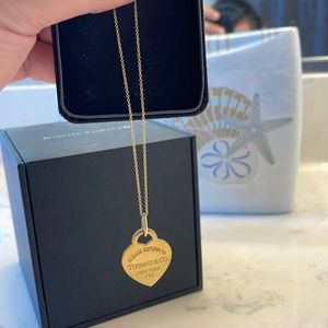Tiffany and Co. Return to Tiffany heart tag necklace and 18 k gold.
